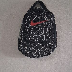 Nike Black Lunchpack with Red Swoosh and White Text